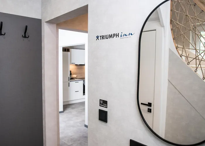 Triumph Ferienhaeuser & *